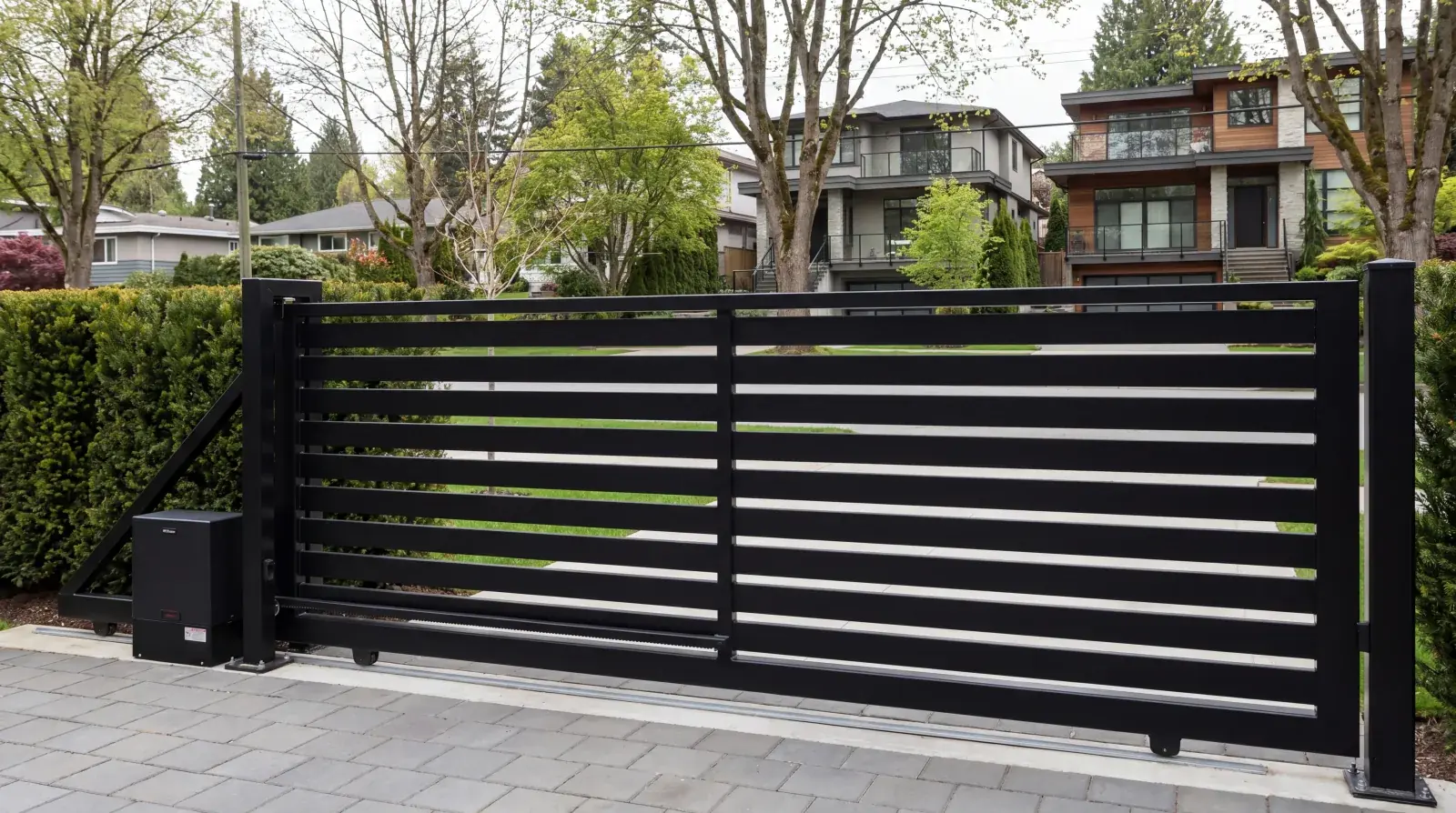 Custom steel driveway gate fabricated by Jeff and Simon Ironworks for a Vancouver residential property