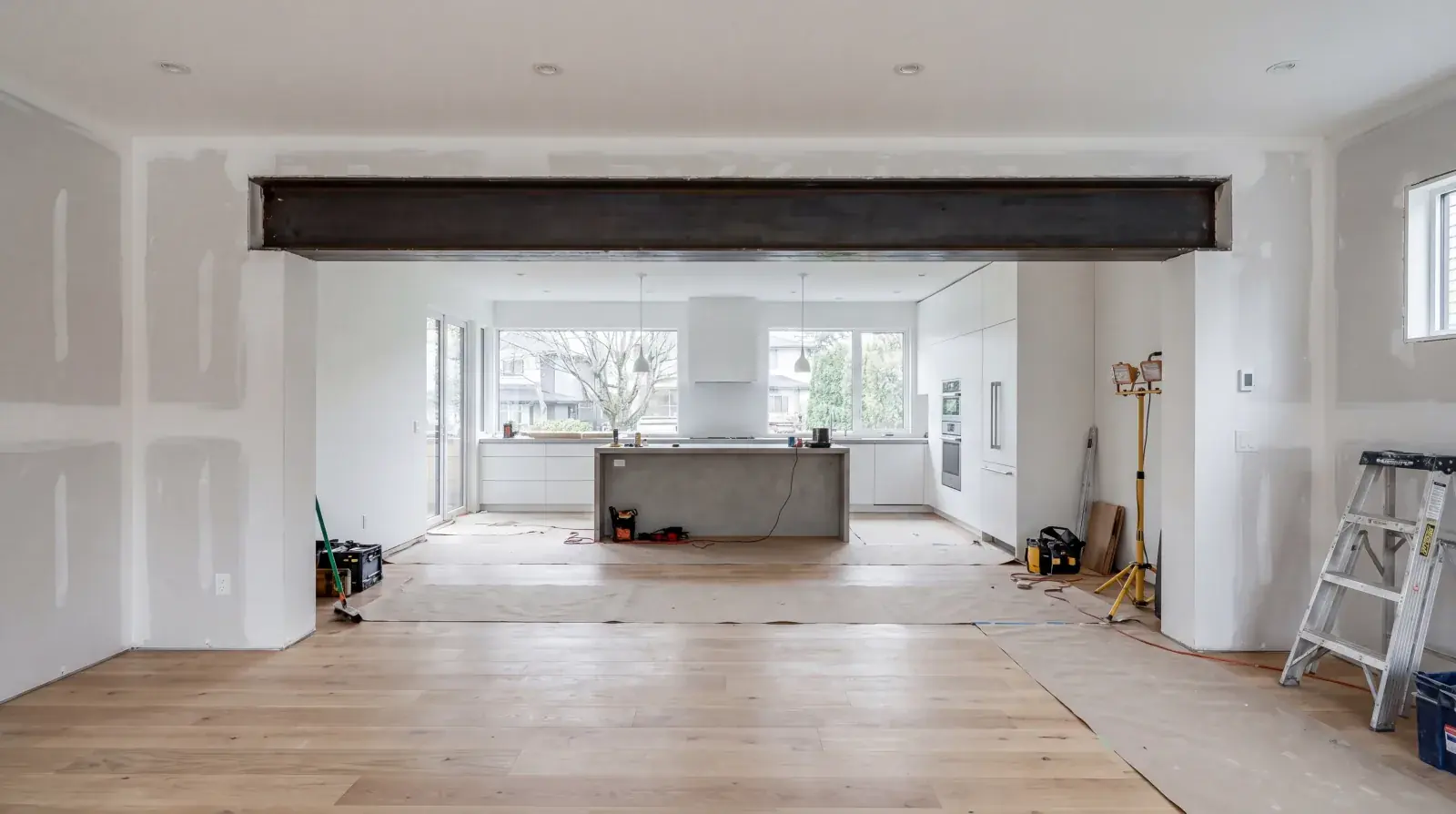 Structural steel beam installed to replace a load-bearing wall in a Vancouver residential renovation