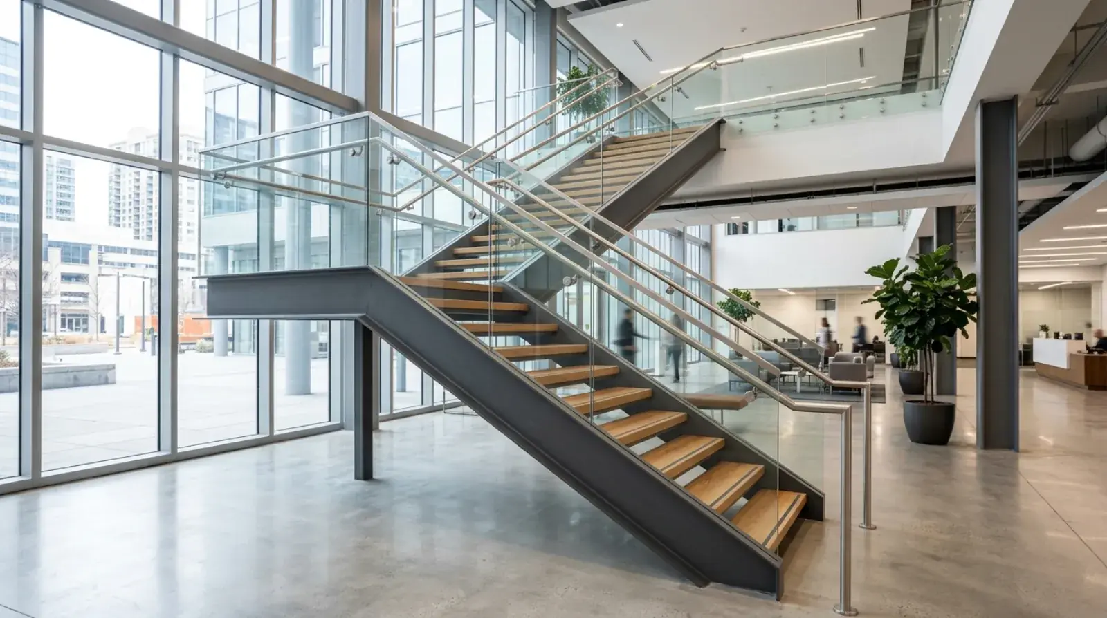 Custom fabricated steel staircase with guardrails installed inside the Passport Canada office space in Richmond BC