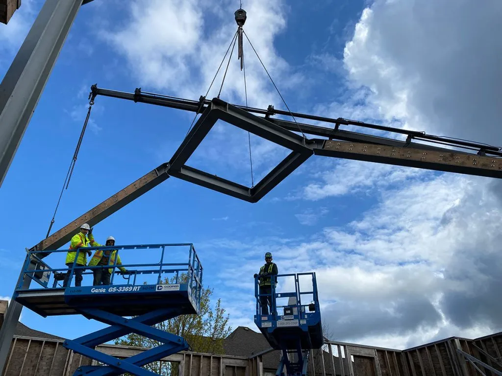 Powder-coated steel fabrication detail at Jeff and Simon Ironworks shop in Burnaby BC