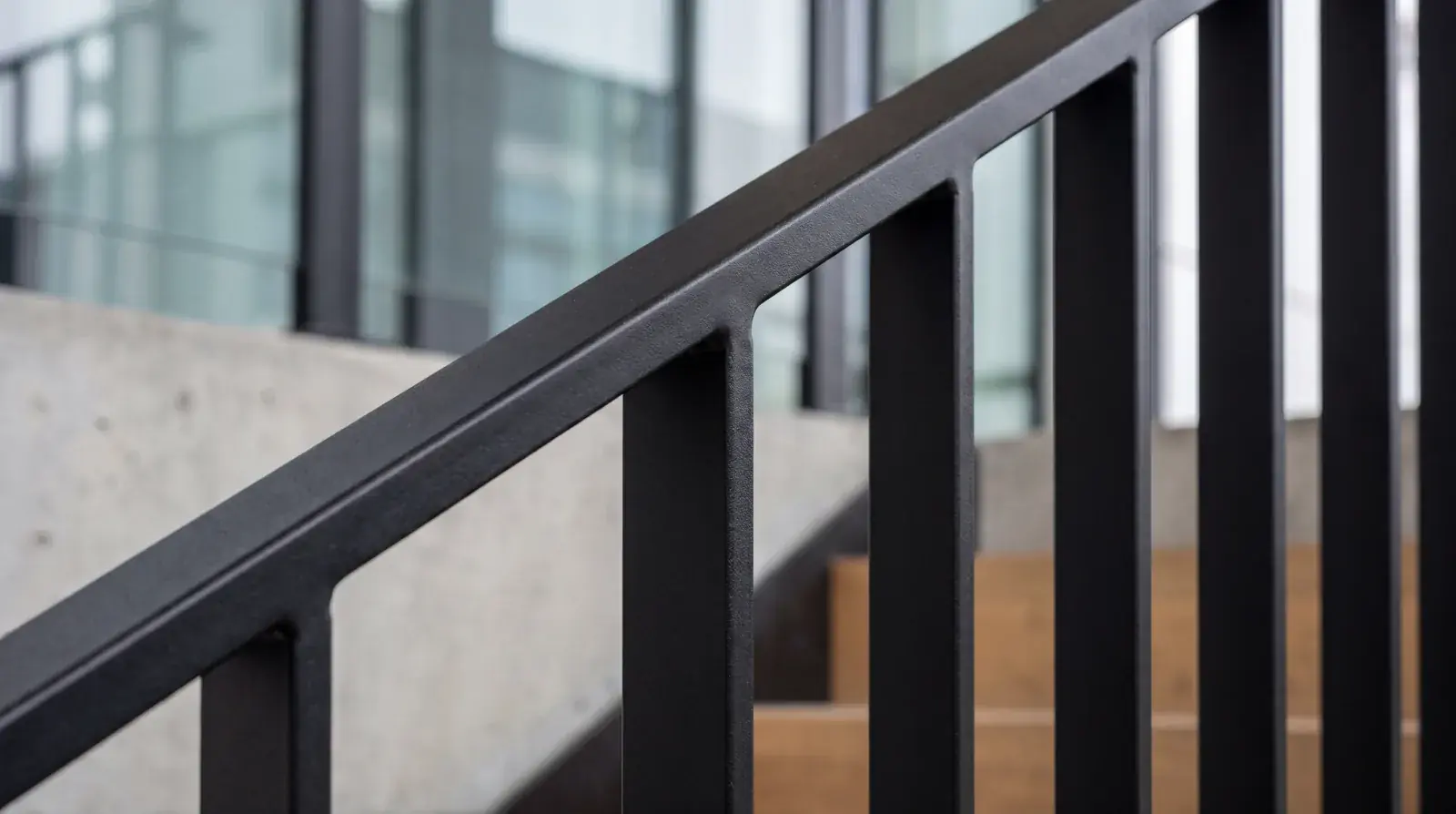 Detailed view of a structural steel connection with base plates and stiffener plates fabricated in Burnaby