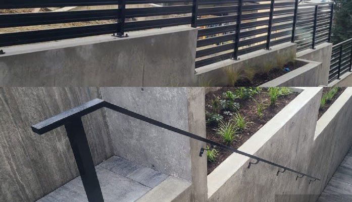 Custom metal railings and handrails along concrete retaining walls at Vancouver residential project